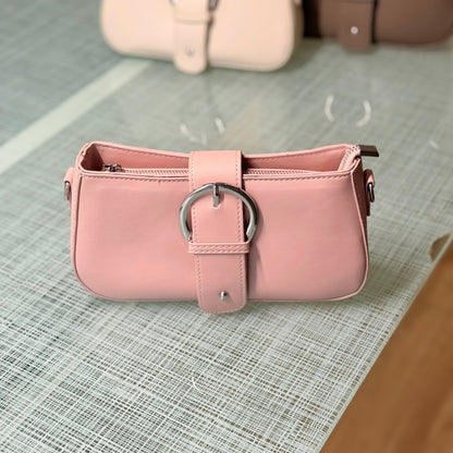 Pink handbag with a silver buckle